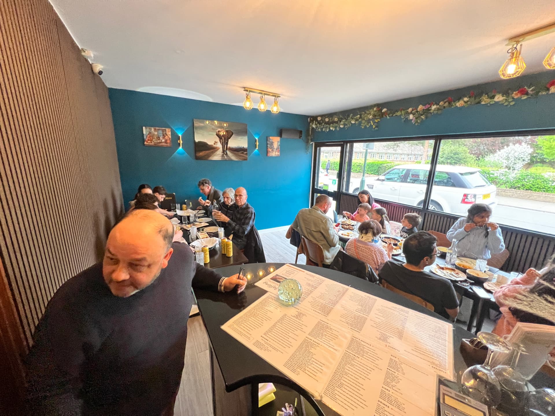 Photograph 6 of 6: Guests dining together in the Jaflong Tandoori restaurant in Richmond